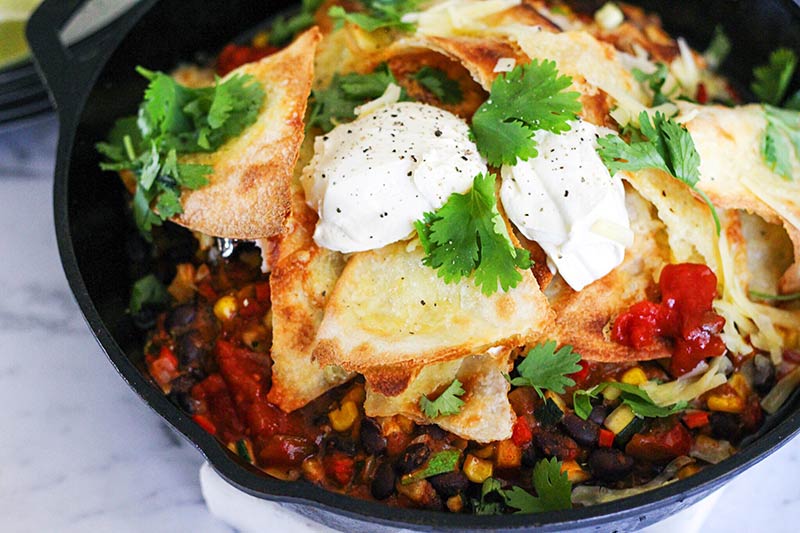 mexican enchiladas, sour cream, coriander